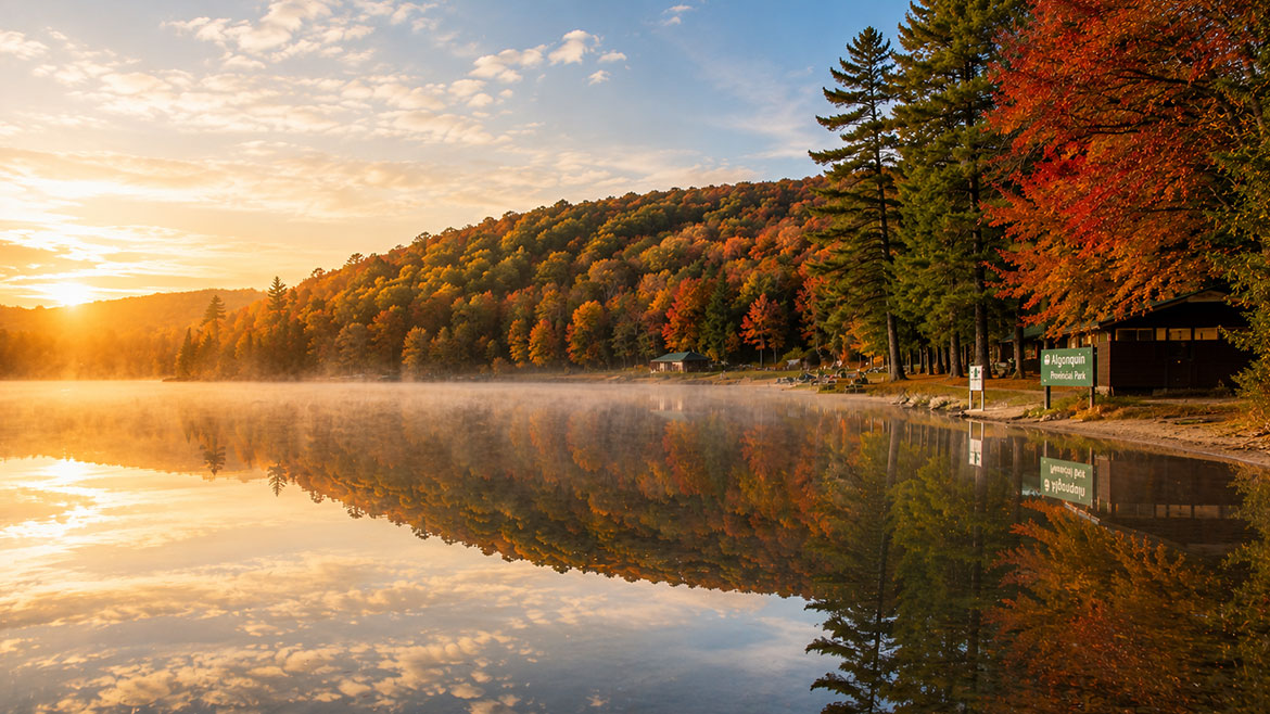 Peaceful sunrise over a calm lake in Algonquin Provincial Park, Ontario