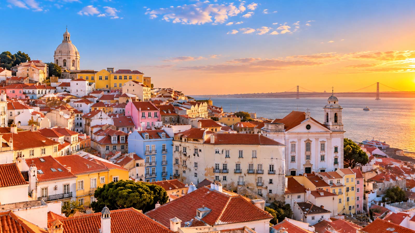 Alfama district and Tagus River in Lisbon, Portugal- Alaedin Travel Canada