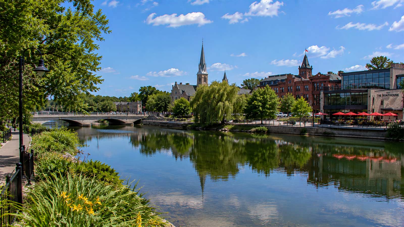 Avon River waterfront with historic buildings in Stratford, Ontario
