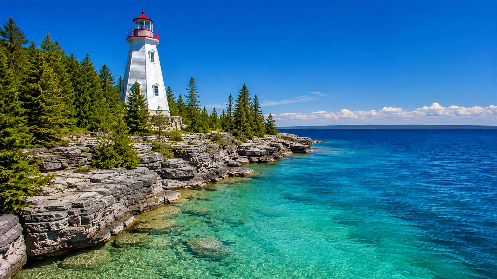 Flowerpot Island lighthouse and rocky shoreline near Tobermory, Ontario
